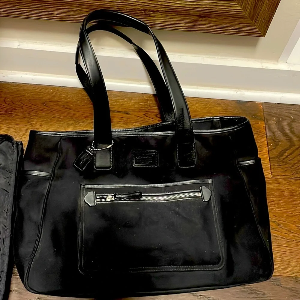 Coach diaper bag. Vintage. EUC. Solid black with lots of pockets. Includes pad